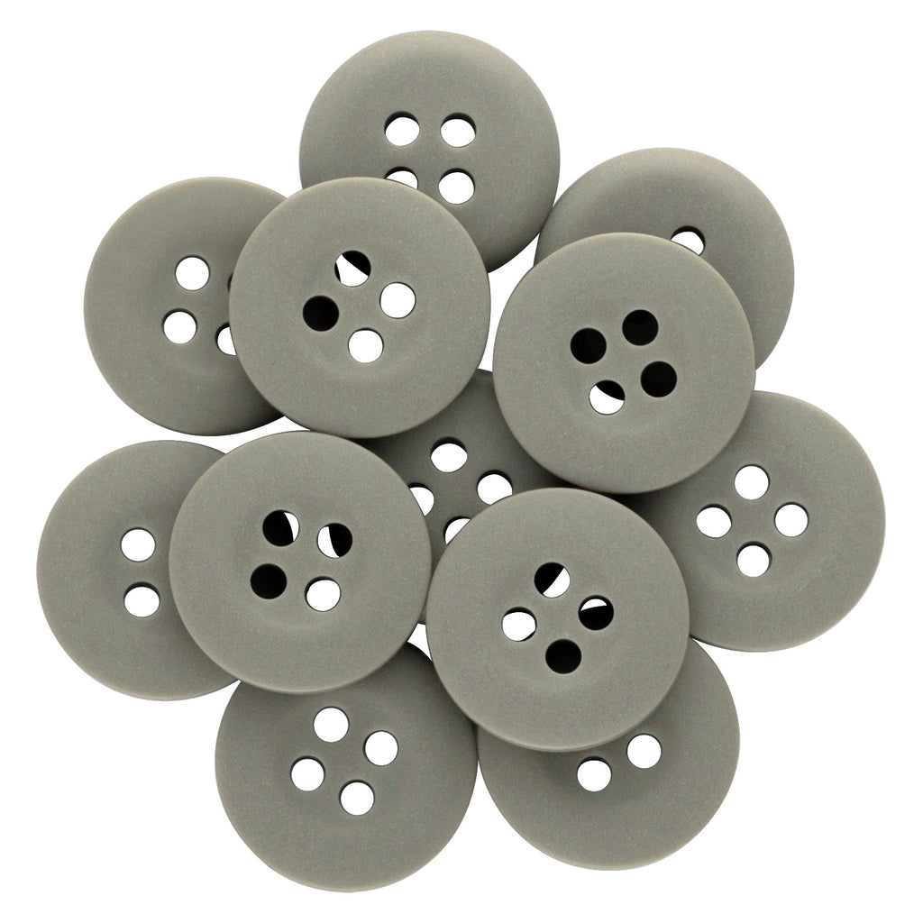 A pile of Khakis, Chinos and Casual Cotton Pant Buttons—round, gray nylon with four holes each—arranged in an overlapping pattern.