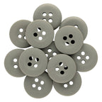 A pile of Khakis, Chinos and Casual Cotton Pant Buttons—round, gray nylon with four holes each—arranged in an overlapping pattern.