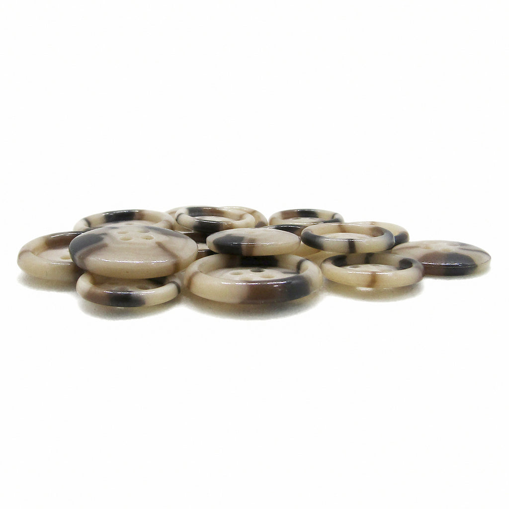 A set of Luxury Suit Buttons, featuring round, brown and beige marbled vegan designs, displayed on a white surface.