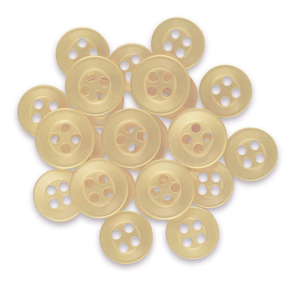 A pile of beige, round Replacement Shirt Buttons with a matte finish is scattered on a white background.