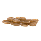 A stack of round, light brown Vegan Faux Horn Suit Buttons with four holes is arranged on a white background.