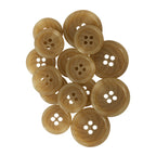A cluster of Vegan Faux Horn Suit Buttons in brown, featuring four holes, is displayed on a white background.