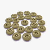 Twenty-two beige Work Pants Buttons arranged in a circular pattern on a white background.