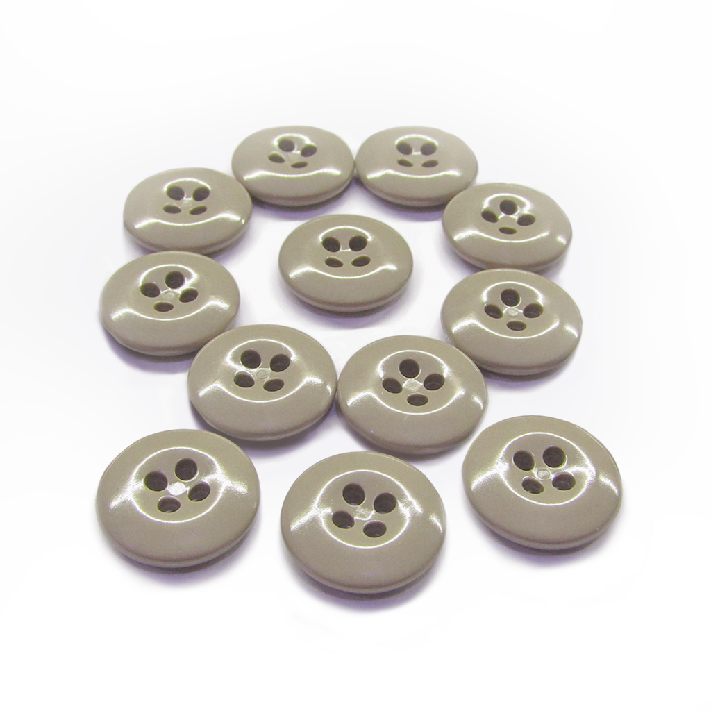 Twelve beige Work Pants Buttons with four holes are arranged in a circular pattern on a white background.