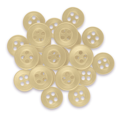 A pile of Replacement Shirt Buttons, small, round, and cream-colored, is scattered on a white background.