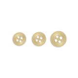 Three Replacement Shirt Buttons of different sizes are arranged in a row on a white background.