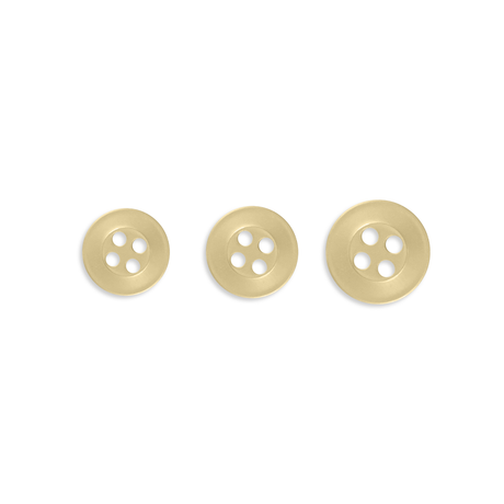 Three Replacement Shirt Buttons of different sizes are arranged in a row on a white background.
