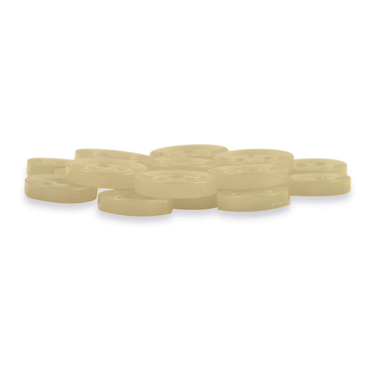 A pile of Replacement Shirt Buttons—small, round, light beige with four holes each—is neatly arranged on a white surface.
