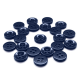 Workshop Uniform Shirt Buttons: durable nylon buttons with two and four holes, ideal for workshop uniforms, displayed in a circular pattern on a white background.