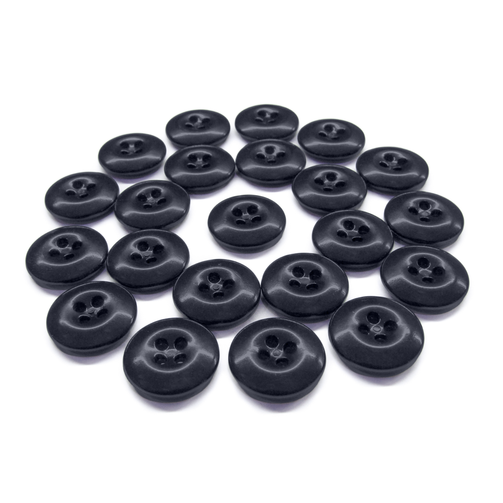 A set of round, black Work Pants Buttons featuring four holes in a classic pattern, displayed on a white background.