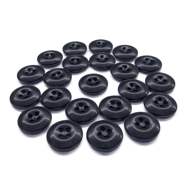 A set of round, black Work Pants Buttons featuring four holes in a classic pattern, displayed on a white background.