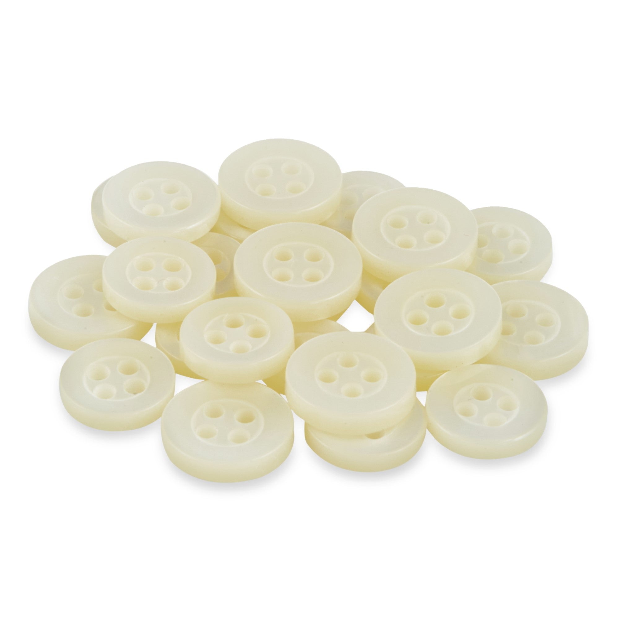 A stack of small, round, white Replacement Shirt Buttons with a matte finish is scattered on a white background—an ideal choice for any tailor’s kit.