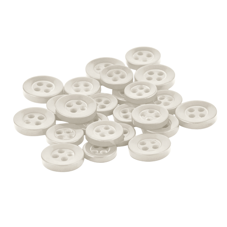 A set of small, round, white Replacement Shirt Buttons from a tailor’s kit scattered on a white background.