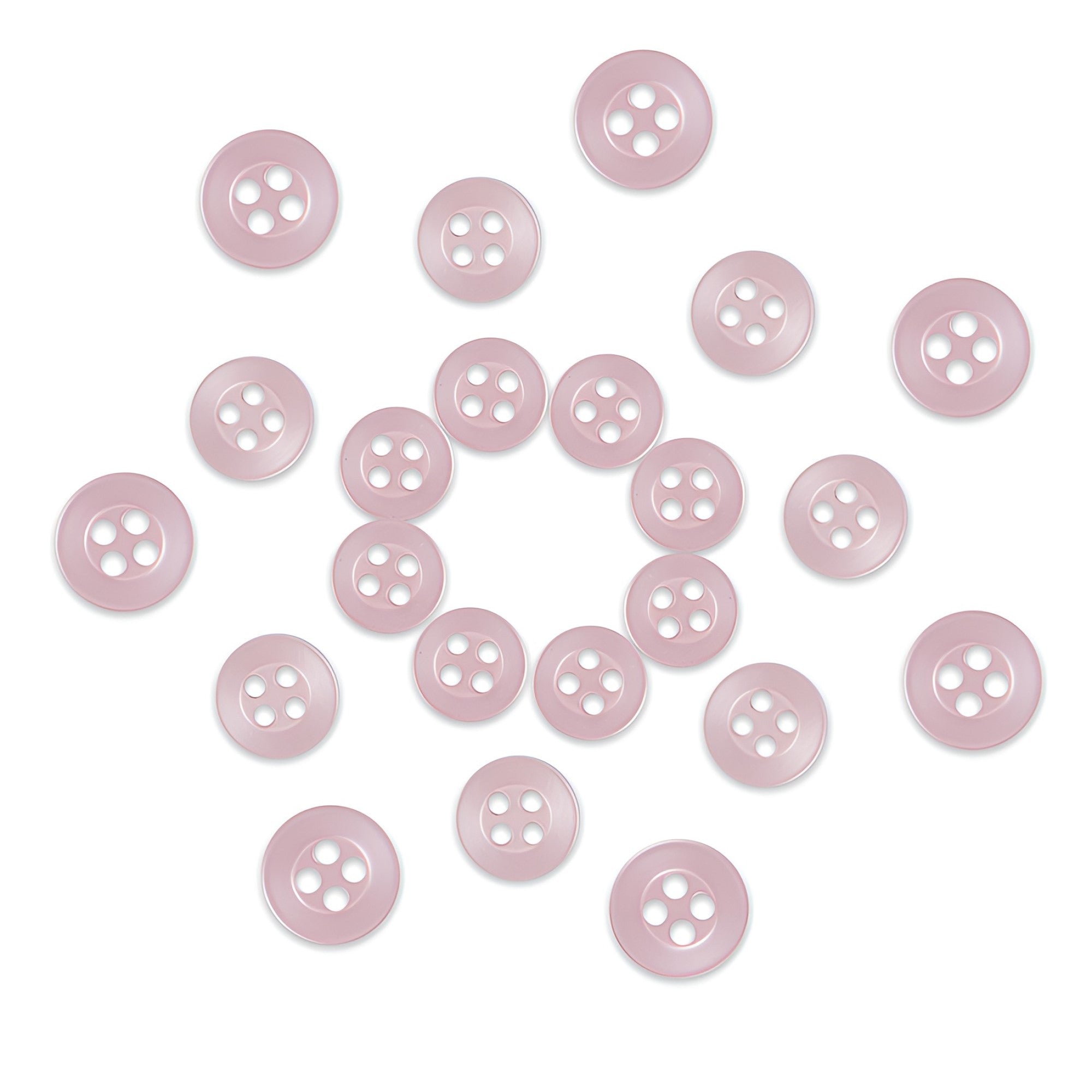 Twenty-four Replacement Shirt Buttons in light pink with a matte finish and four holes are arranged in a loose circle on a white background—an ideal addition to any tailor’s button kit.