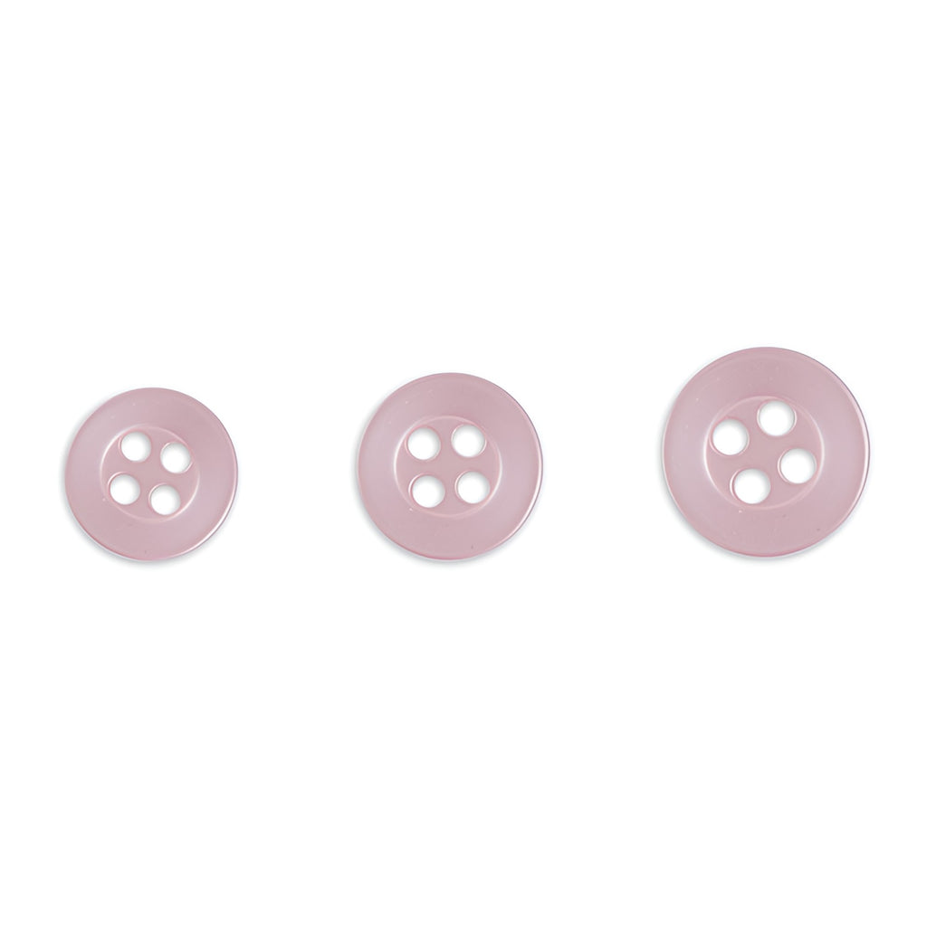 Three Replacement Shirt Buttons in pink poly-nylon, each a different size with a matte finish, are arranged in a row on a white background—ideal for any tailor’s button kit.