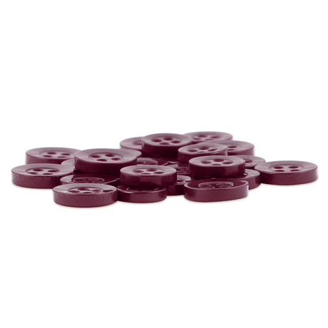 A pile of Replacement Shirt Buttons—round, dark purple poly-nylon with four holes and a matte finish—stacked and scattered on a white background; great for any tailor's kit.