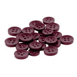 A pile of Replacement Shirt Buttons, round and dark maroon with a matte poly-nylon finish, rests on a white background—an essential for any tailor's kit.