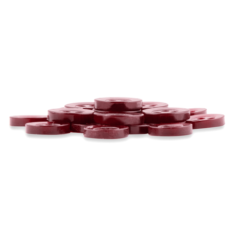 A pile of Replacement Shirt Buttons with a maroon, matte finish, stacked together on a white background.
