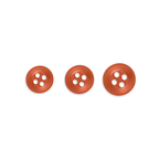 Three Replacement Shirt Buttons in varying sizes, made from orange poly-nylon, are displayed in a row on a white background.