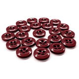 A set of shiny maroon Work Shirt Buttons with four holes is arranged in neat rows on a white background.