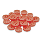 A pile of Replacement Shirt Buttons—round and orange, made from poly-nylon—ideal for a tailor’s kit, rests on a white background.