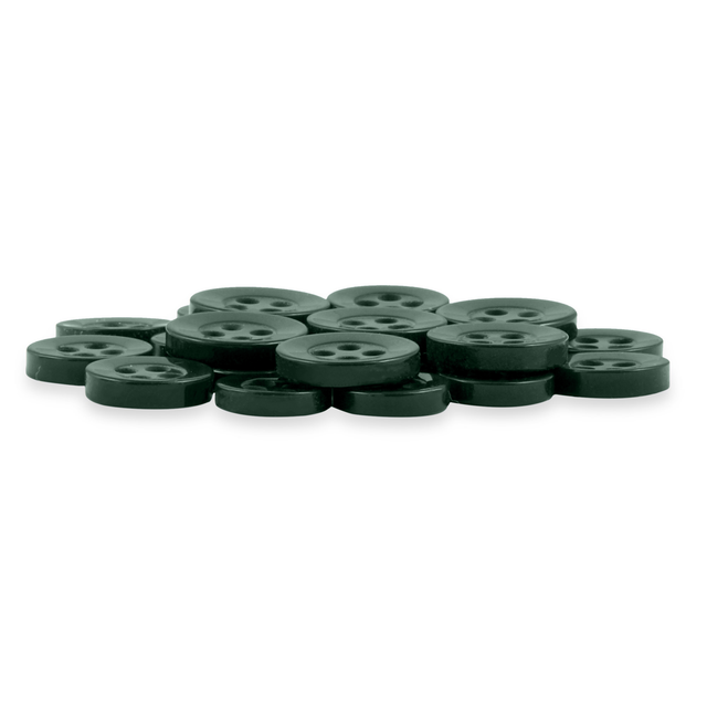 A pile of Replacement Shirt Buttons in dark green, round, four-hole poly-nylon, displayed on a white background—an ideal addition to any tailor's kit.