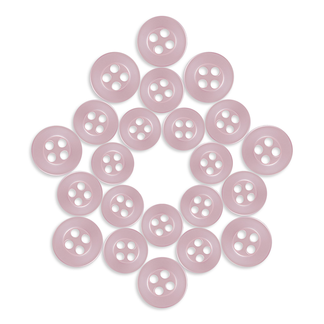 Replacement Shirt Buttons in light pink, known for their durability, are displayed in a symmetrical star pattern on a white background.