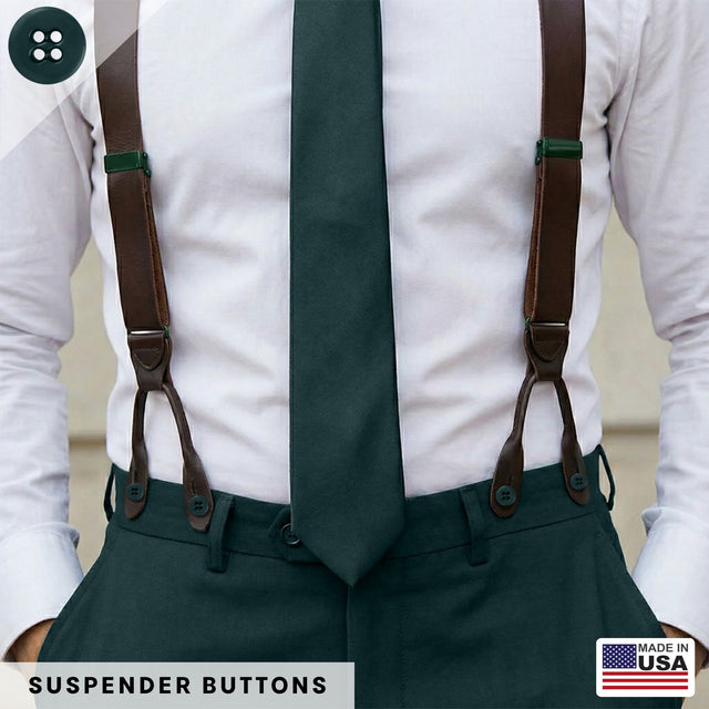 A man in a white shirt, green tie, and pants is wearing brown button-on suspenders attached with authentic Suspender Brace Pant Buttons, made in the USA.