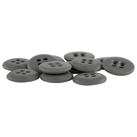 A collection of Suspender Brace Pant Buttons—gray, round, four-hole sewing buttons inspired by military spec designs—scattered on a white background.