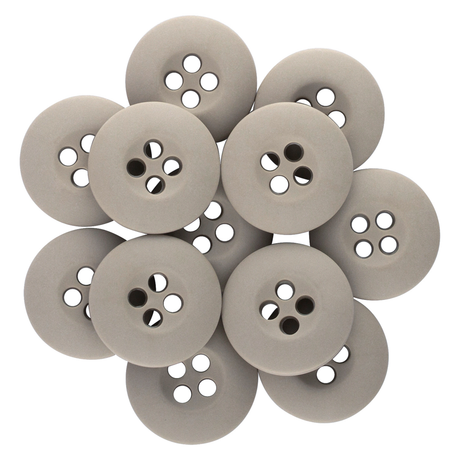 A cluster of ten gray, round Tactical Buttons made from melamine, each with four holes, arranged in an overlapping pattern.