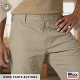 A person wearing beige work pants stands with hand on hip. Text: Work Pants Buttons 22 Pack. Featuring military-grade fasteners for lasting durability. Made in USA label in corner.