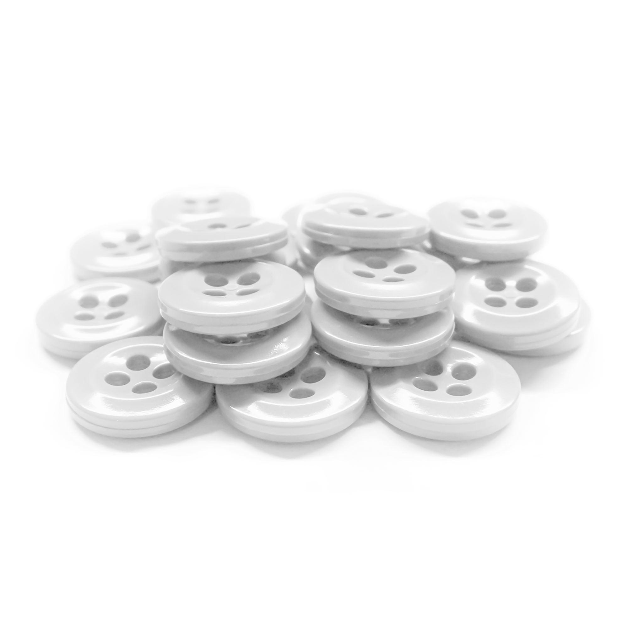 A stack of shiny white Work Shirt Buttons 12 Pack, featuring four holes, displayed on a white surface.