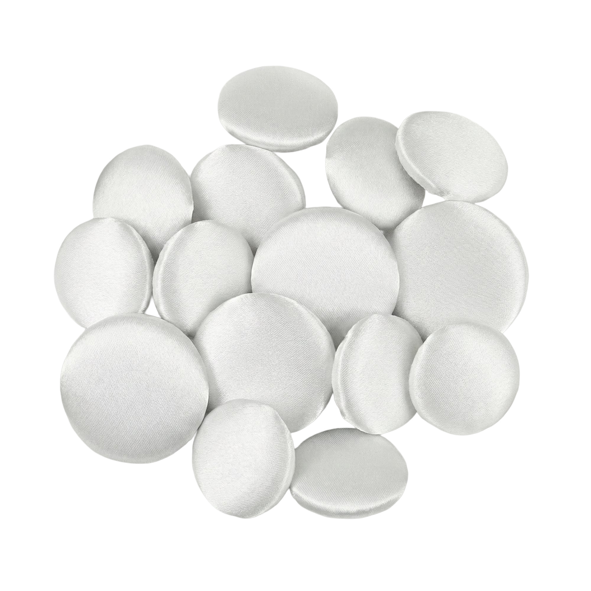 A pile of round, white satin Tuxedo Suit Buttons arranged on a white background.