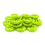 A stack of vibrant green Work Shirt Buttons 12 Pack, featuring four holes and durable construction, shown on a white background.