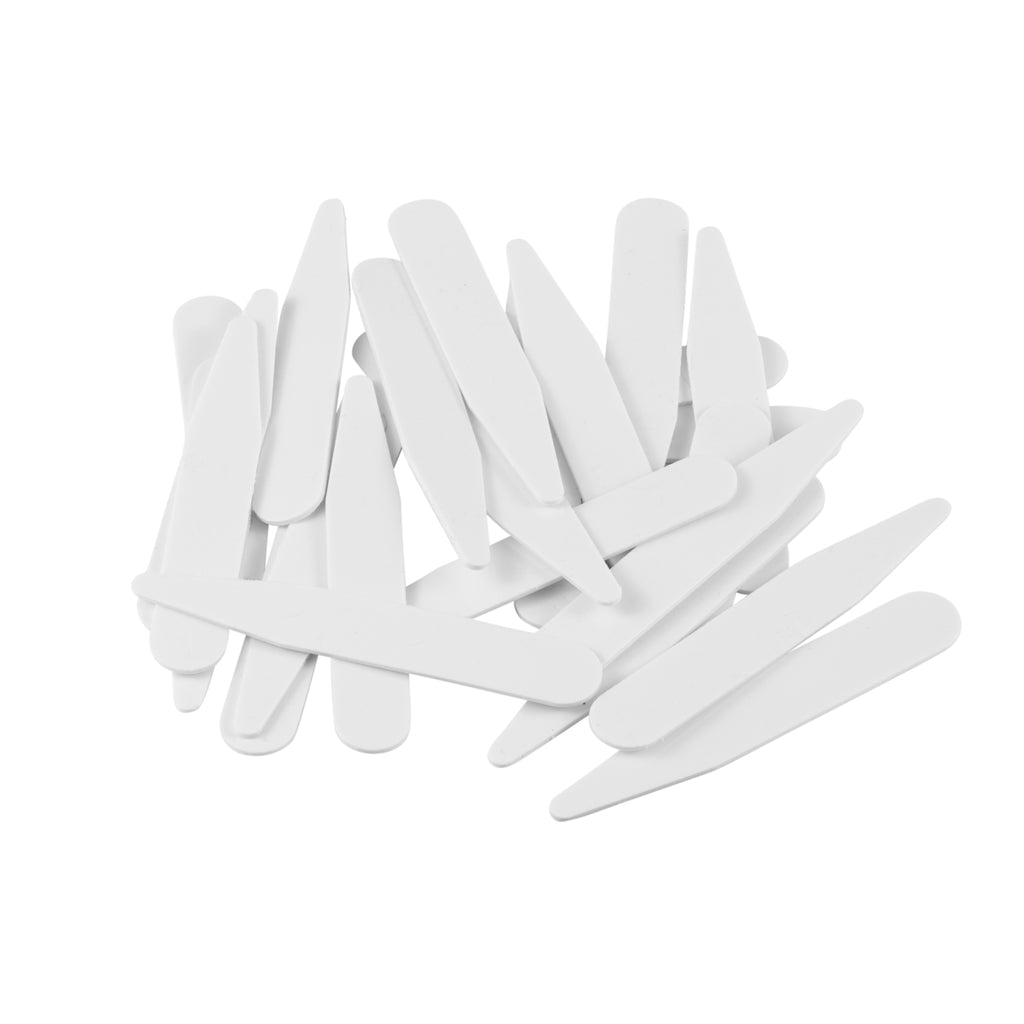 A pile of Collar Stays scattered on a white background, perfect for providing essential support to your shirt collars.